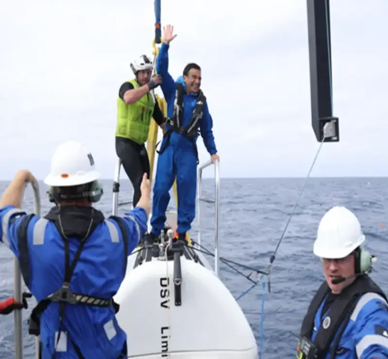 News - Osvaldo Ulloa emerging from DSSV Pressure Point, after the first ever dive to the depths of the Atamaca trench.